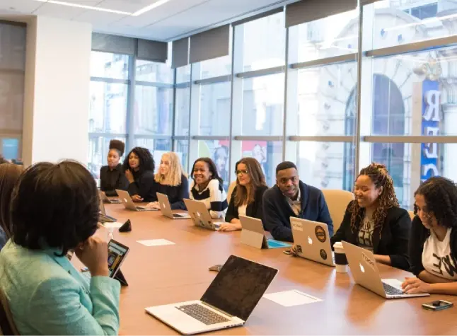 Salesforce Classic to Lightning Migration workshop with business teams collaborating in a modern office meeting